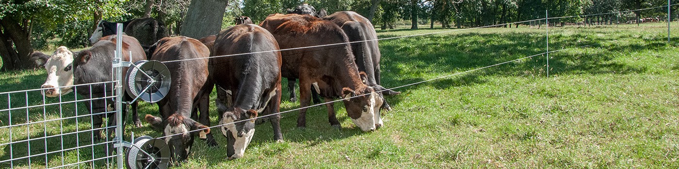 Reels hold the twine, tap or polywire for a portable electric fence.