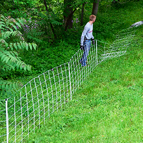 The grassy margins are an easier section to fence. No brush to wrestle through.