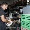 Chef Michael Scelfo prepping in the kitchen.