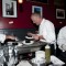 Chef Mark Hosack and his assistants plating for the judges table.