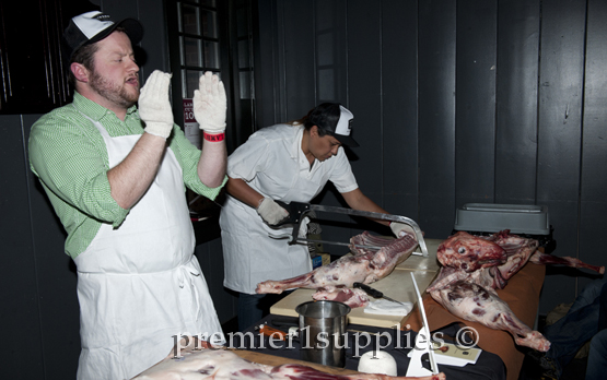 Demonstrating how to "break" a lamb.